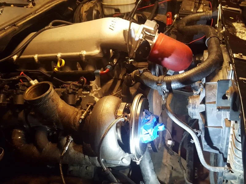 Engine bay - lots of stuff.