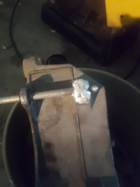 Threaded a bolt in and started welding.