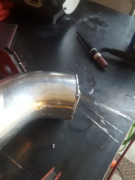 Welded a generous lip onto piping.