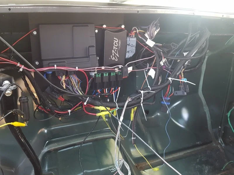 Cable management hook under the dash.