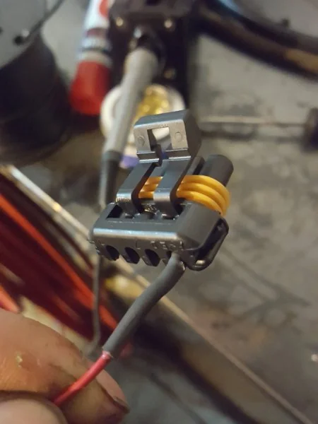 Step 2. Use heat-shrinking around the resistor, and insert into the terminal.