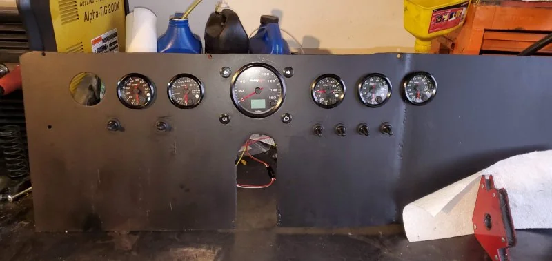 Dash with most gauges mounted.