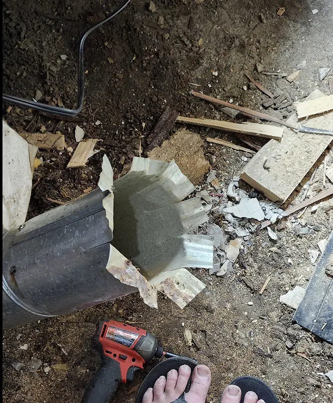 Picture of 1" duct, with several small cuts around the radius.