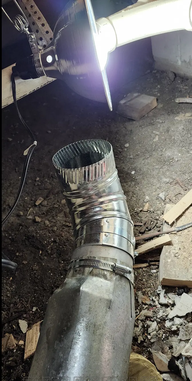 Picture showing 90 degree bend installed on homemade 5" to 4" reducer
