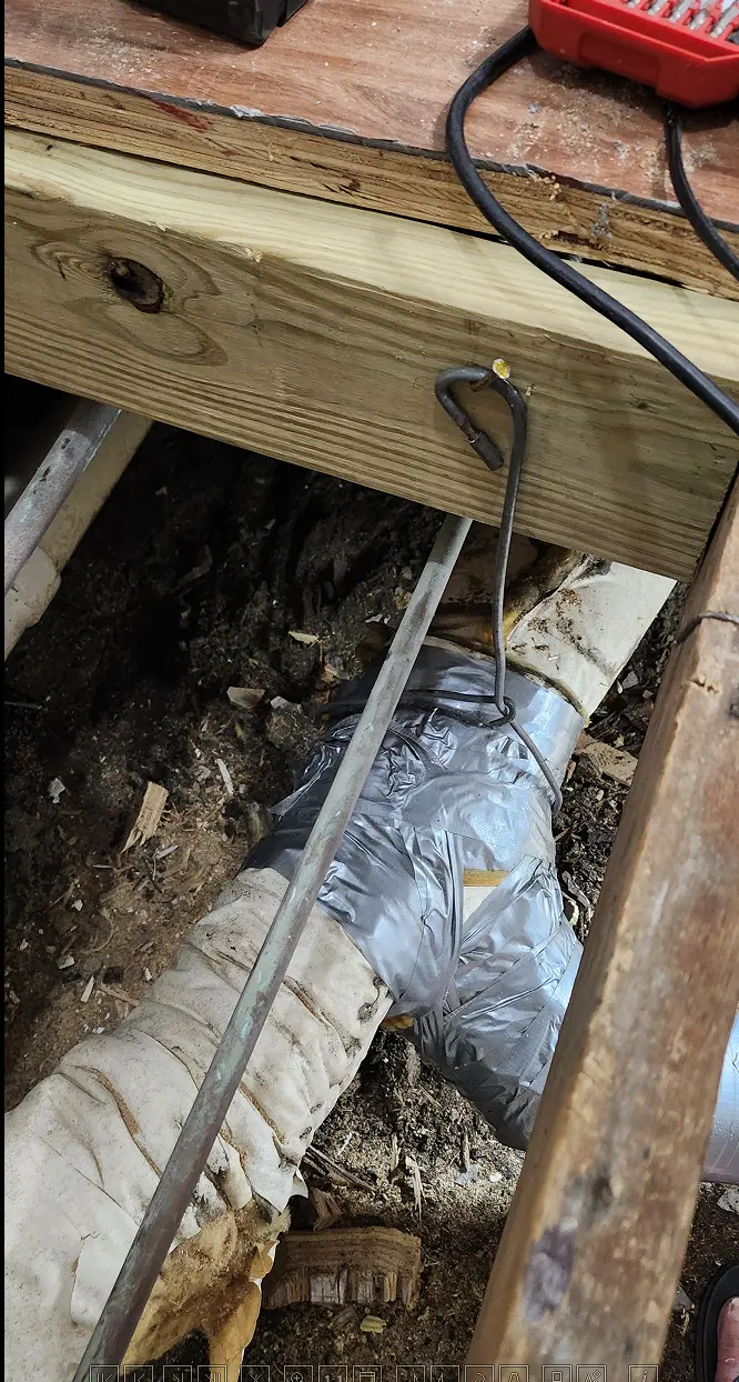 Image showing homemade hanger holding up duct work