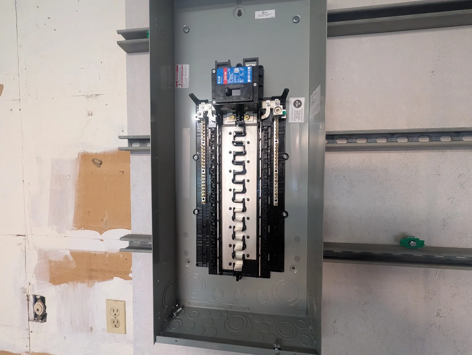 Main panel hung from the top strut with no factory holes aligned to the lower strut rail