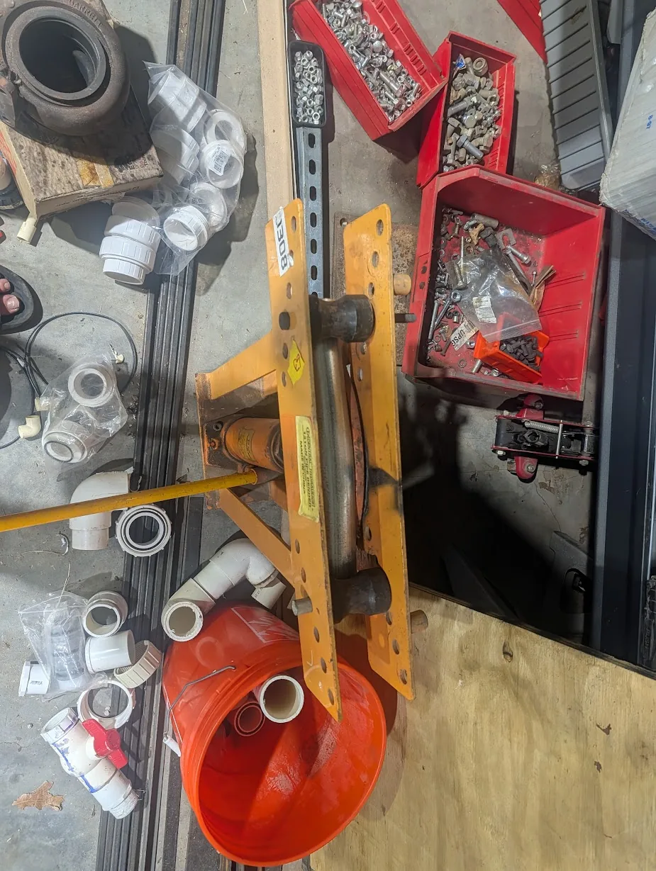 Hand pipe bender on a section of EMT, putting a shallow offset bend in it