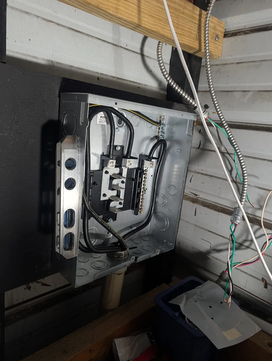 2/2/2/4 feeder bent into a service loop inside the new shed panel