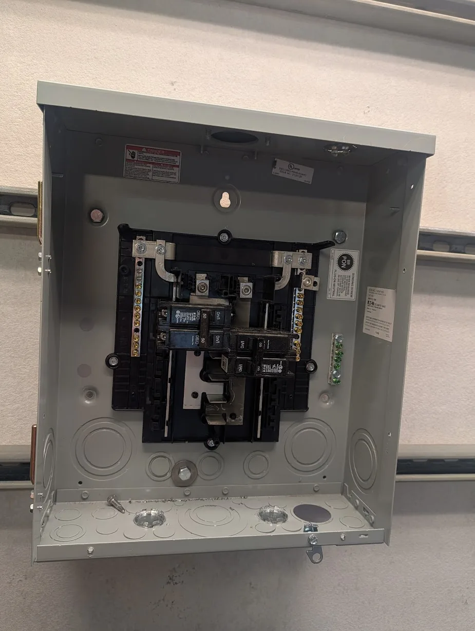 Subpanel mounted with a washer at the lower screw point
