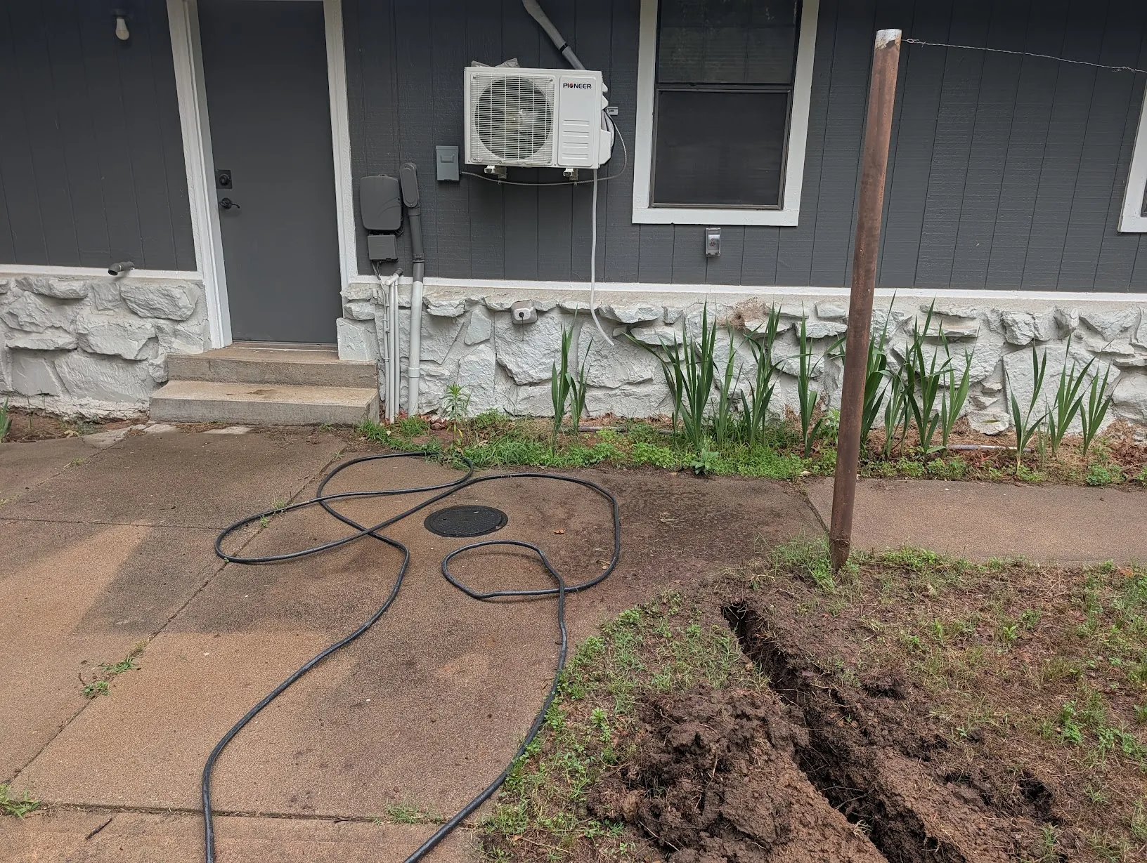 Where the cables and conduit will enter the house
