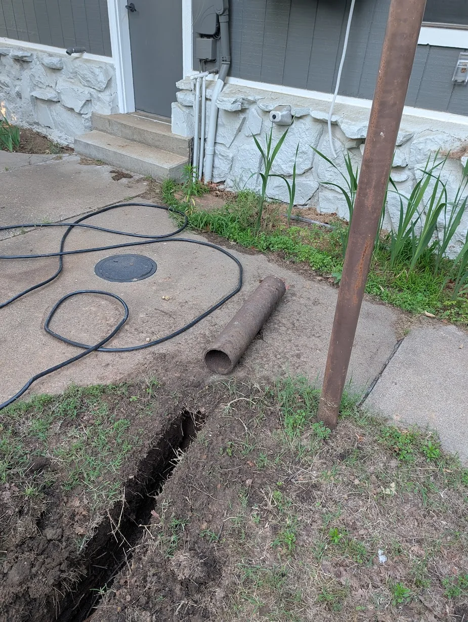 Steel channel set to bore under the sidewalk