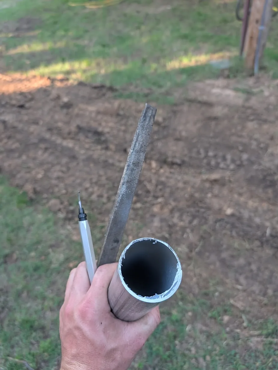 Freshly cut 2" EMT showing a rough, burred edge
