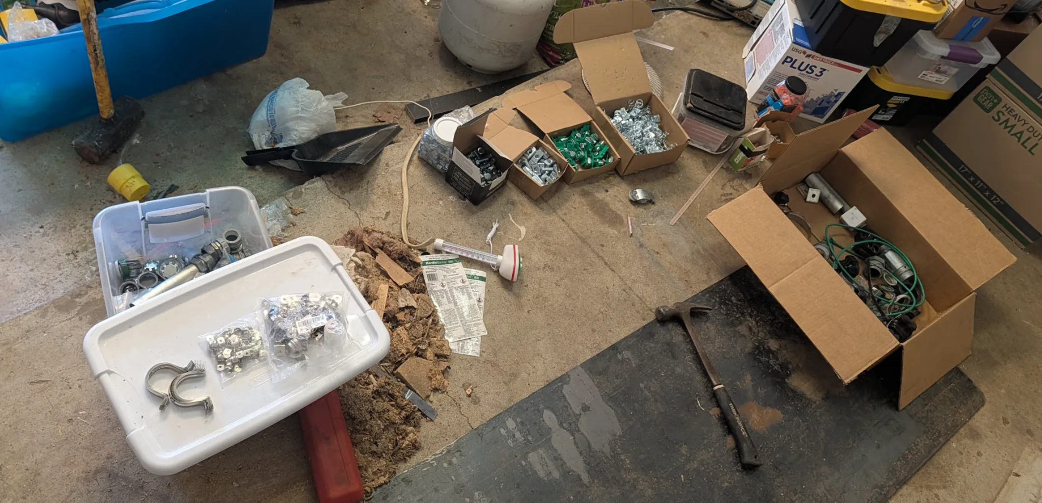 Boxes of strut channel nuts, bolts and assorted mounting hardware