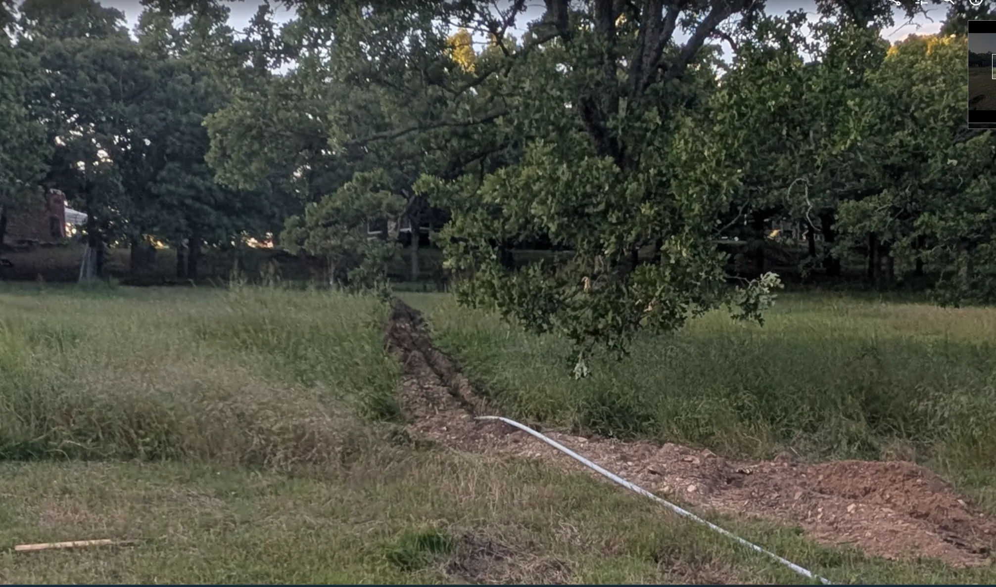 Trench seen from the solar field looking back toward the house