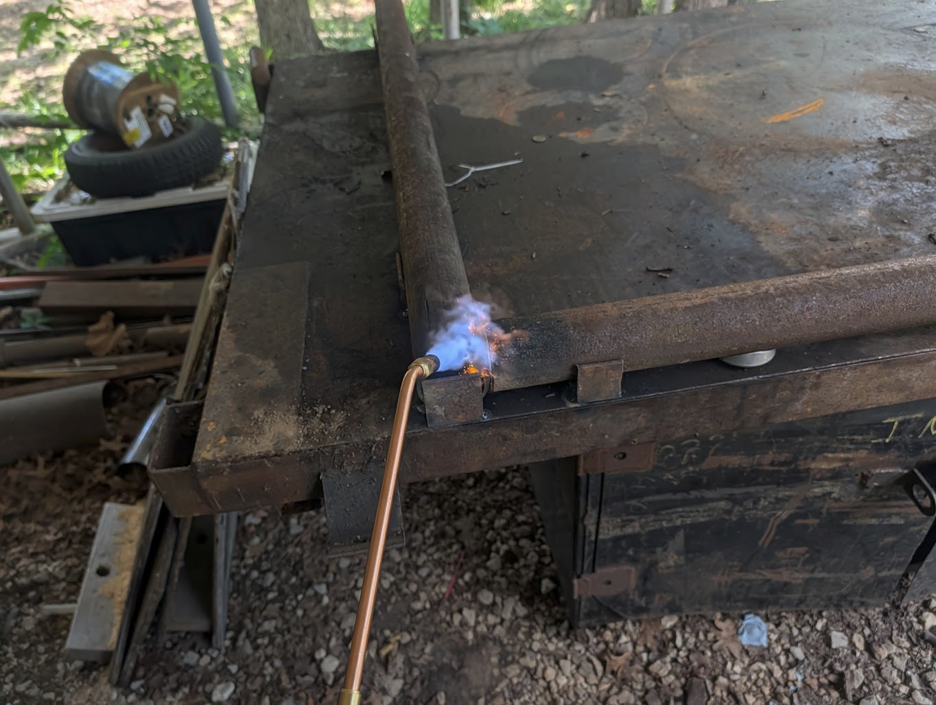 Pipe joint being pre-heated before welding