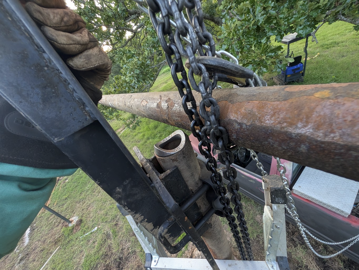 Welding the second post connection at the top of the frame