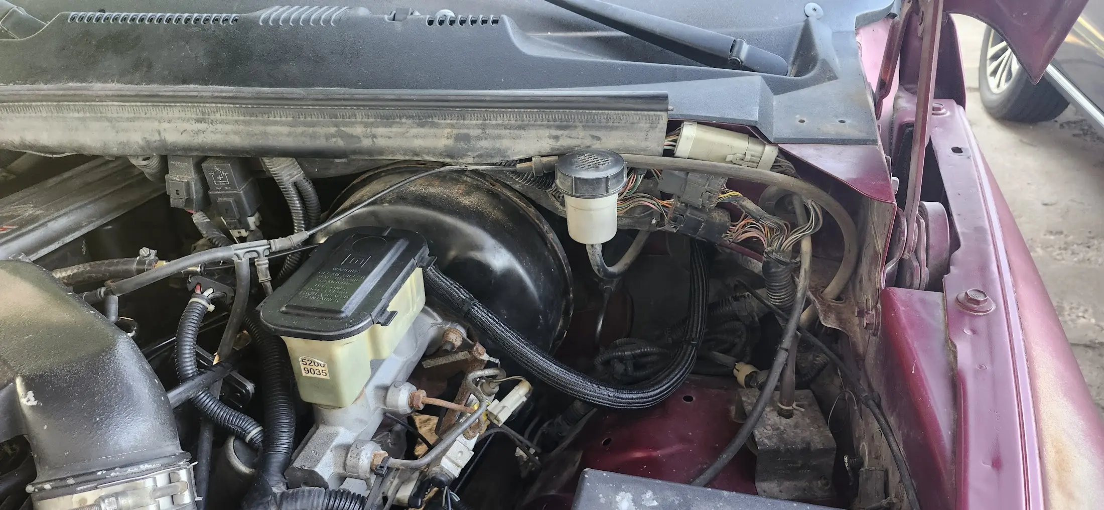 Image showing the lines wrapped in cable shroud, passed into the cab