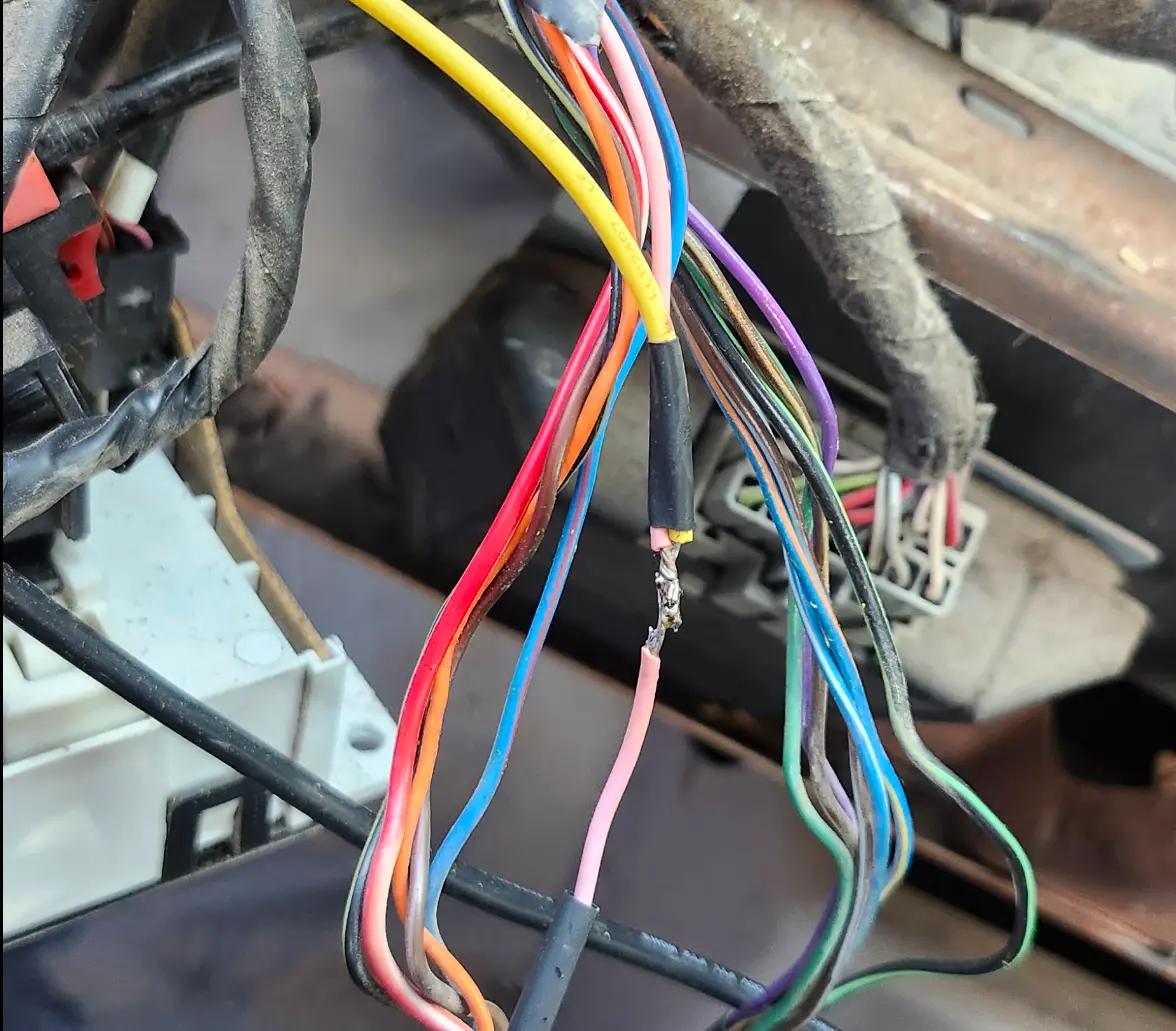 Image showing my solder connection to the power wire on the back of the radio.