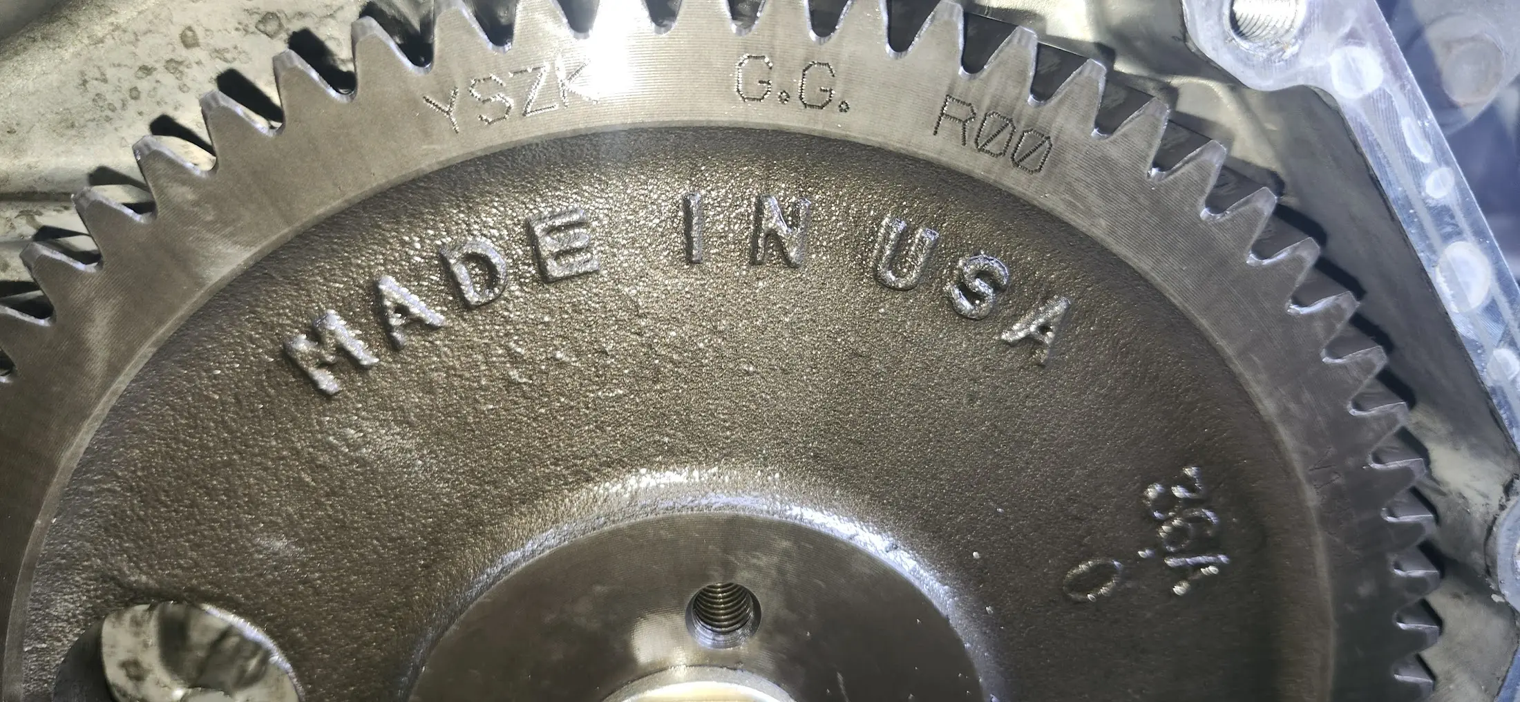 Picture of the timing gear on the injection pump, with a large MADE IN USA written on the top