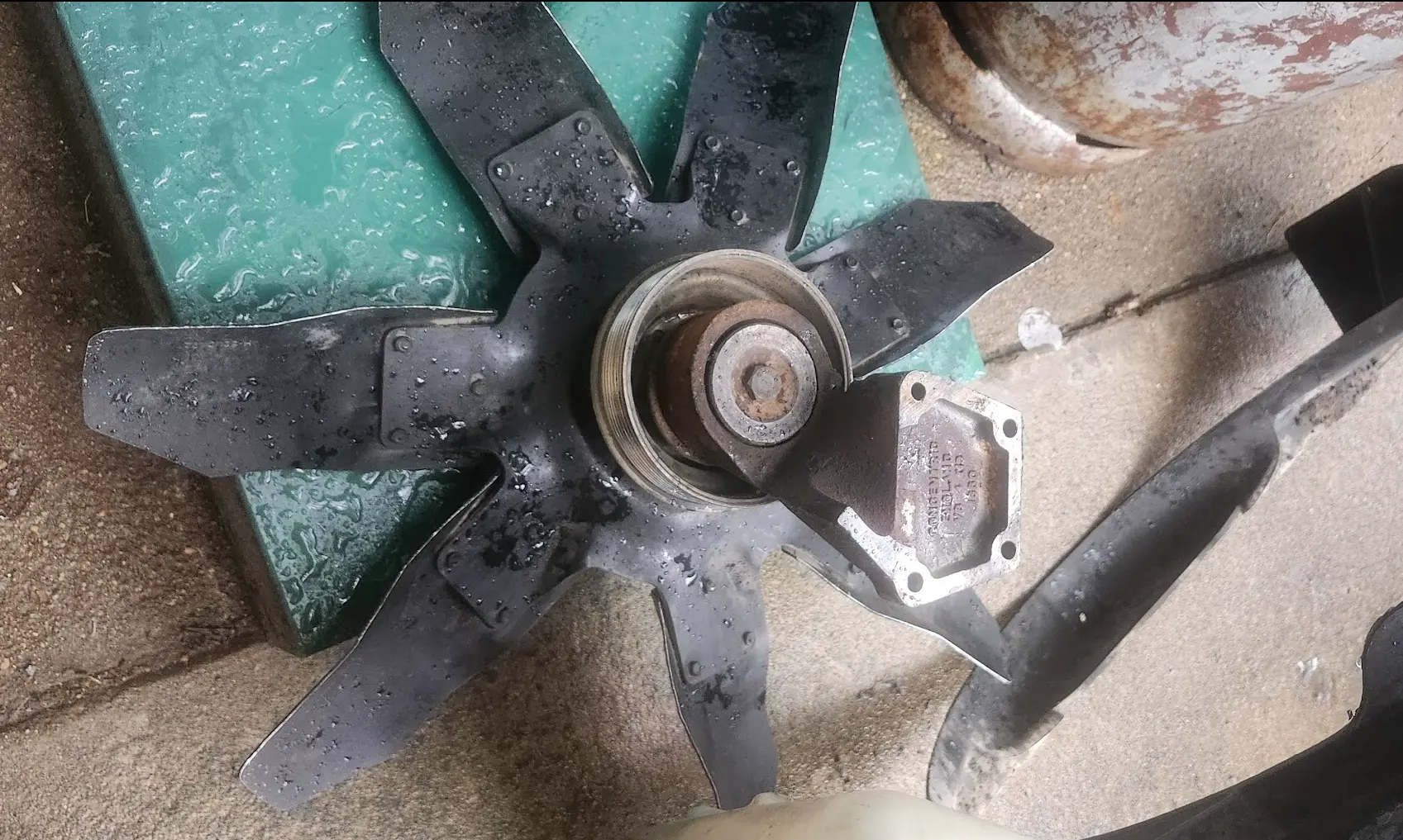Picture of the cooling fan, and bracket removed from the truck.