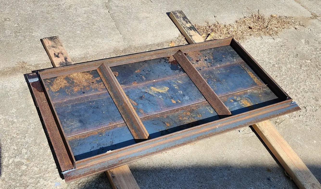 Image showing angle-iron frame onto of the steel plate, with reinforcing ribs in the middle