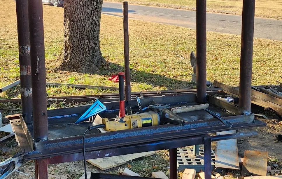 Photo showing the table, with all four legs welded on.