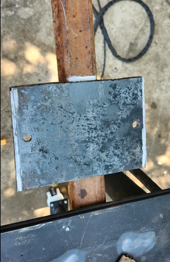 With the base of the grinder removed, A line was drawn where to cut the square tubing