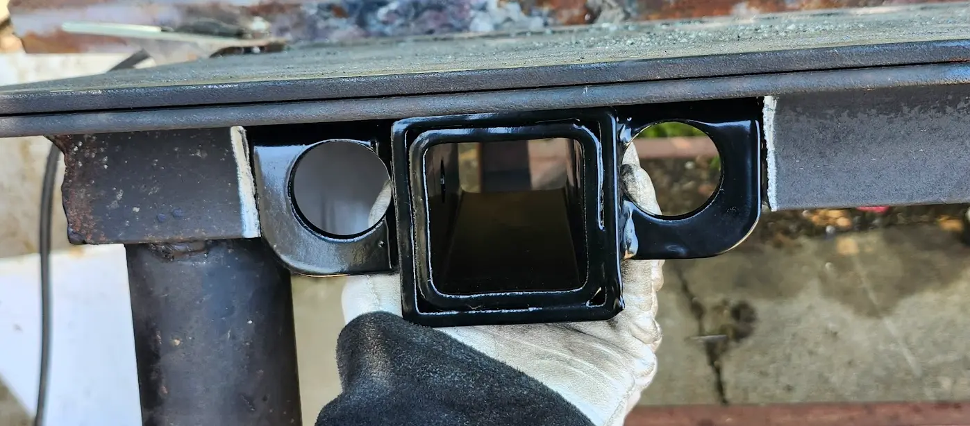 Angle iron cut from table, mount mocked into place