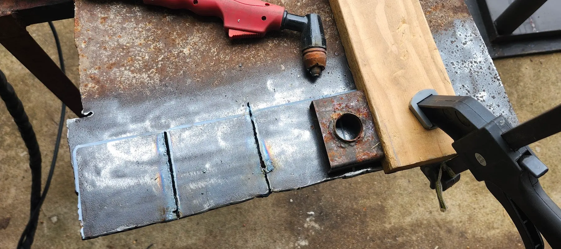 Photo showing half of the pads cut out, using homemade plasma guide