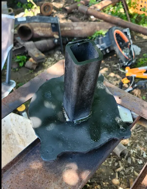 The vise mount with a coating of spray paint