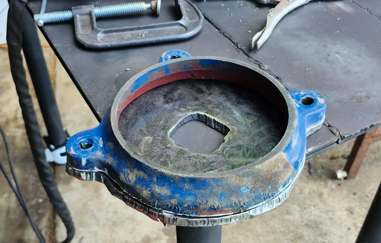 The base of the vise setting on the new piece of plate