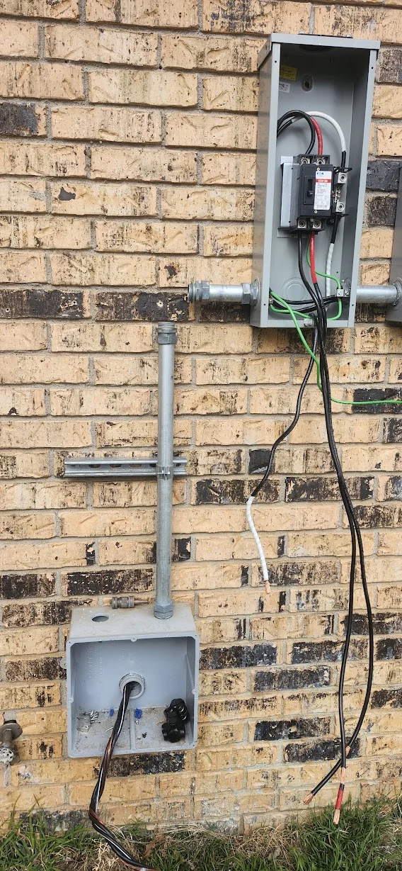 Exterior wall after removal — only the main shutoff remains