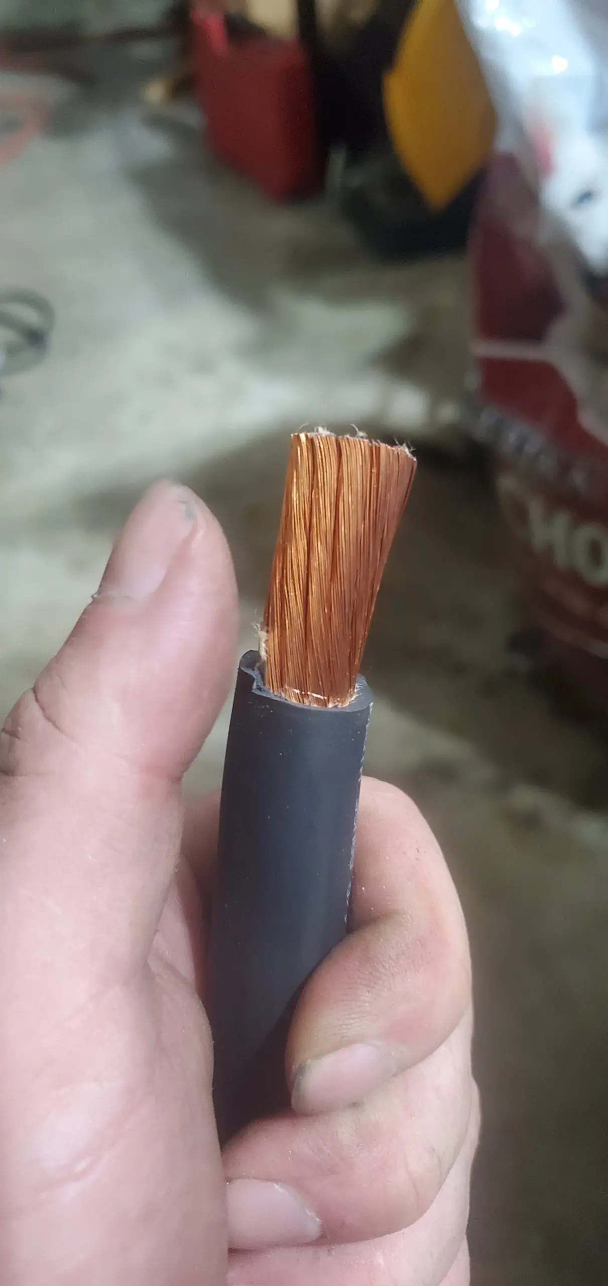 Stripped copper, with my thumb for scale.